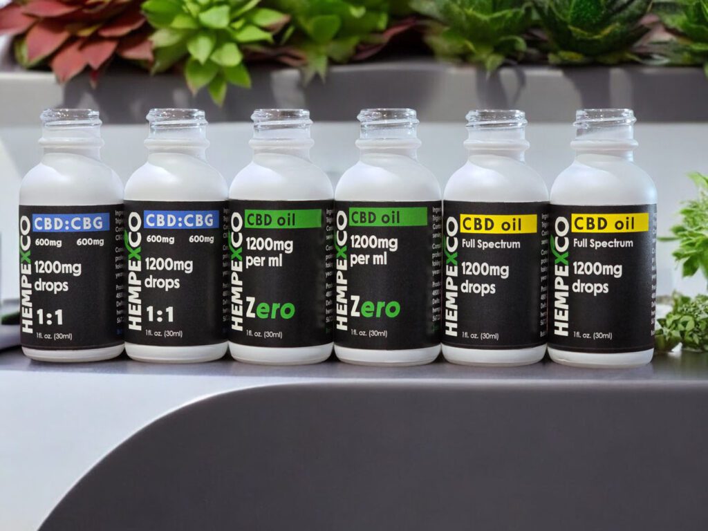 Hempexco CBD Oil Tincture bottles on a counter
